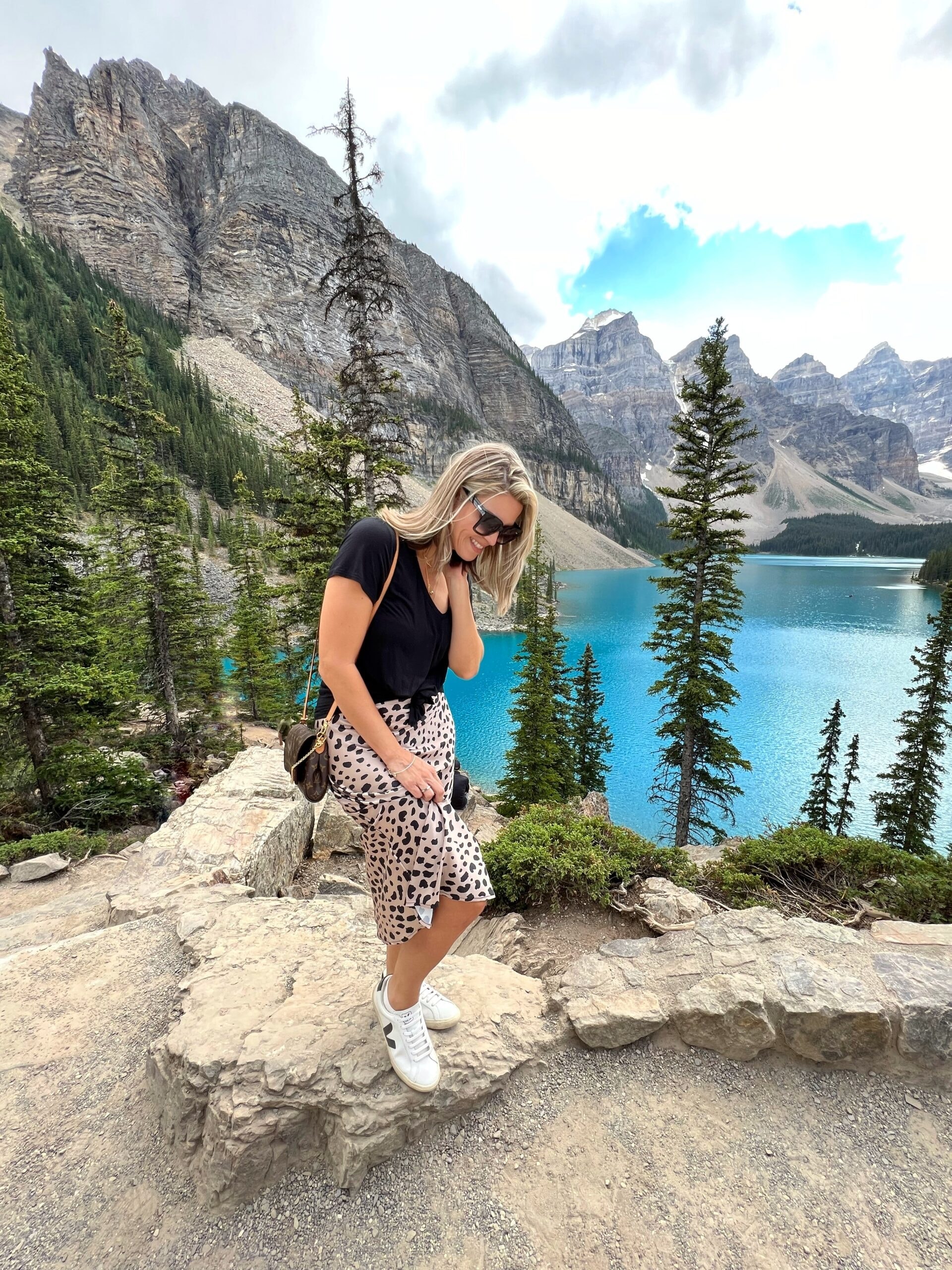 Camila at Banff Moraine Lake in leopard skirt